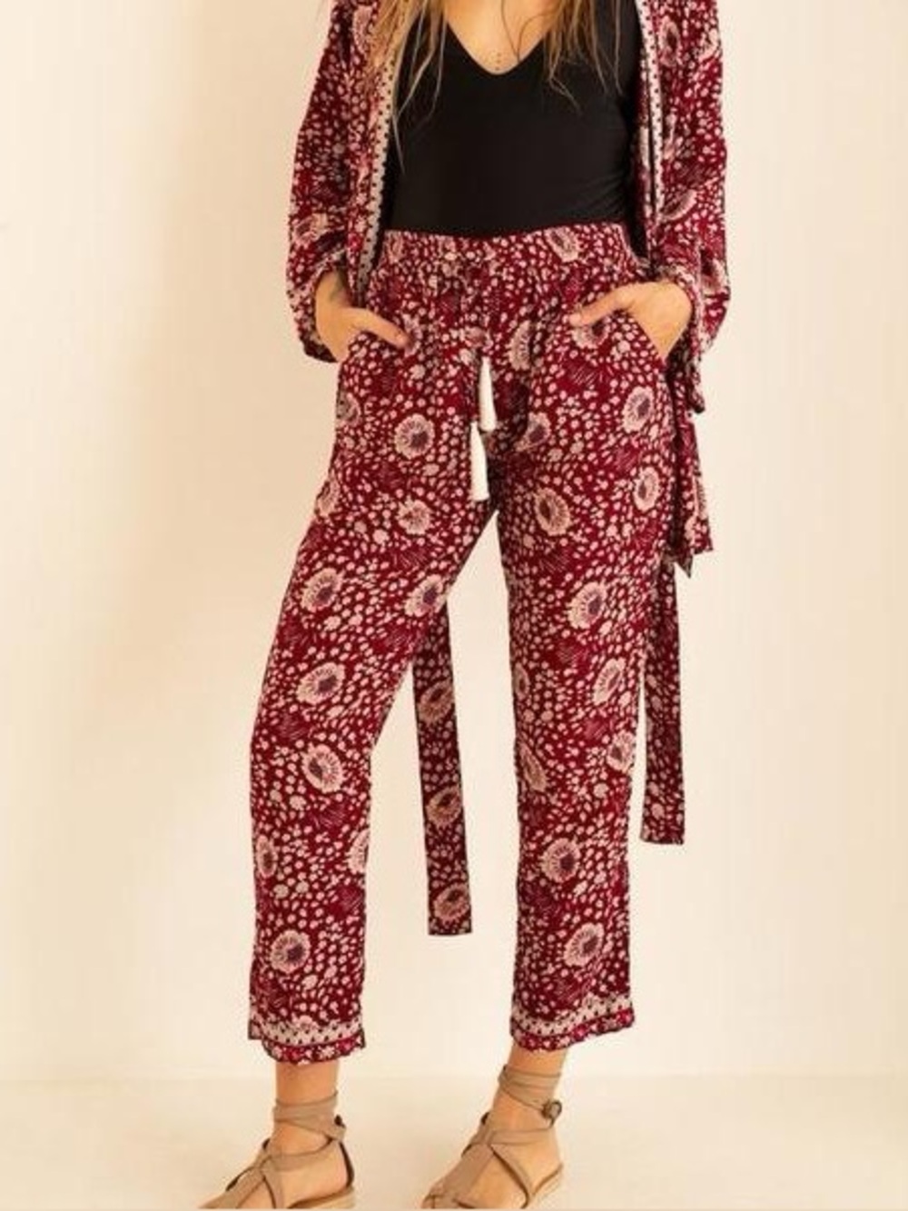 Natalie Martin Bianca tassel pants featuring a vintage red floral print size S